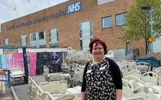 Stacy Hartshorn, project lead for the bed replacement programme at NNUH, with beds that have been donated to Ukraine