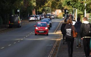 City College students walking along Ipswich Road towards Grove Avenue and Grove Road. Jonathan P Watts says more litter bins are needed in the area