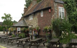 A Norfolk pub and castle have been named among the UK's most haunted locations