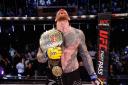 Colchester's James Webb celebrates winning the light heavyweight title at Cage Warriors 180