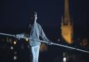 High wire artist, Chris Bullzini, on a 20 metre-high tightrope above Norwich