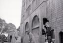 Michael Palin (right) with production staff at the filming of Monty Python's Queen's Own Kamikaze Highlanders sketch at Norwich Castle in 1971