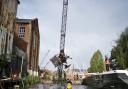 A wrecked boat is recovered from the River Wensum. Picture: Broads Authority