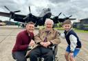 Ray Parke with the 'Just Jane' Lancaster Bomber at Lincolnshire Aviation Museum, with Jonny Cracknell, left, and his son Freddie