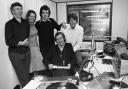 The line-up on Radio Orwell when the station came on the air October 28,1975, included (from the left standing) Harry Rowell, Katie Glass, Greg Bance and Keith Rogers. Seated at the console is Andy Archer.