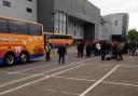 Fans loading on to Sanders Coaches for an away game