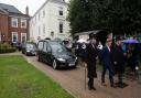 Mourners gathered to pay their respects to Richard Hughes