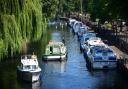 People enjoying the River Wensum in Norwich