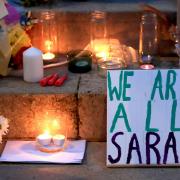 Candles, messages and flowers left on the steps of the Parkinson Building at the University of Leeds in West Yorkshire, during a Reclaim These Streets vigil for Sarah Everard