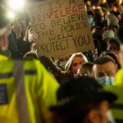 Police front up to demonstrators at a vigil for Sarah Everard in London