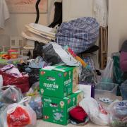 A volunteer sorting through donations for Baby Bank Norfolk