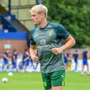 Przemyslaw Placheta sporting the new Norwich City warm-up jersey ahead of Saturday's 6-1 friendly win at King's Lynn Town