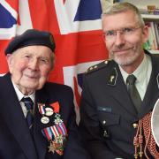 David Woodrow, pictured left and inset, celebrated his 100th birthday just days after receiving a liberation medal ahead of the 80th anniversary of the D-Day landings