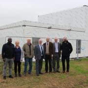 From left: James Onwuka, Jules Royle, Tony Emes, Cllr Martin Murrell, MP Jerome Mayhew, and Cllrs Fran Whymark and Ian Mackie stand behind the new medical centre in Rackheath