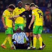 Sheffield Wednesday's Djeidi Gassama surrounded by Norwich City's Jacob Sorensen and Emiliano Marcondes during the Sky Bet Championship match at Hillsborough, Sheffield. Picture date: Tuesday November 5, 2024. PA Photo. See PA story SOCCER Sheff Wed.