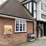 Defibrillator installed outside city pub after months of fundraising efforts