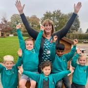 Headteacher Beccy Dewing and pupils from Garrick Green Infant School celebrate its successful Ofsted inspection