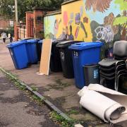 The city's Green Party is at war with City Hall over a fly-tipping issue outside a primary school