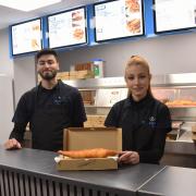 Siblings Ercan and Tuvana behind the counter at Ocean Bites Fish and Chips