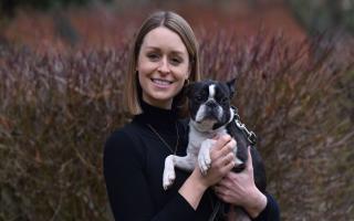 Oa Hackett at the Little Lifts HQ in Norwich with her dog Norma.
Byline: Sonya Duncan