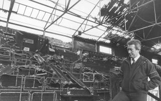 Norwich City manager Ken Brown surveys the damage following the Carrow Road fire in October 1984