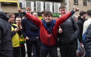 Norwich City fans depart for Leeds from Carrow Road ahead of the Championship play-off semi-final second leg at Elland Road
